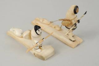 Appraisal: Two Inuit Walrus Ivory Bone Scrimshaw Carvings Two Inuit walrus