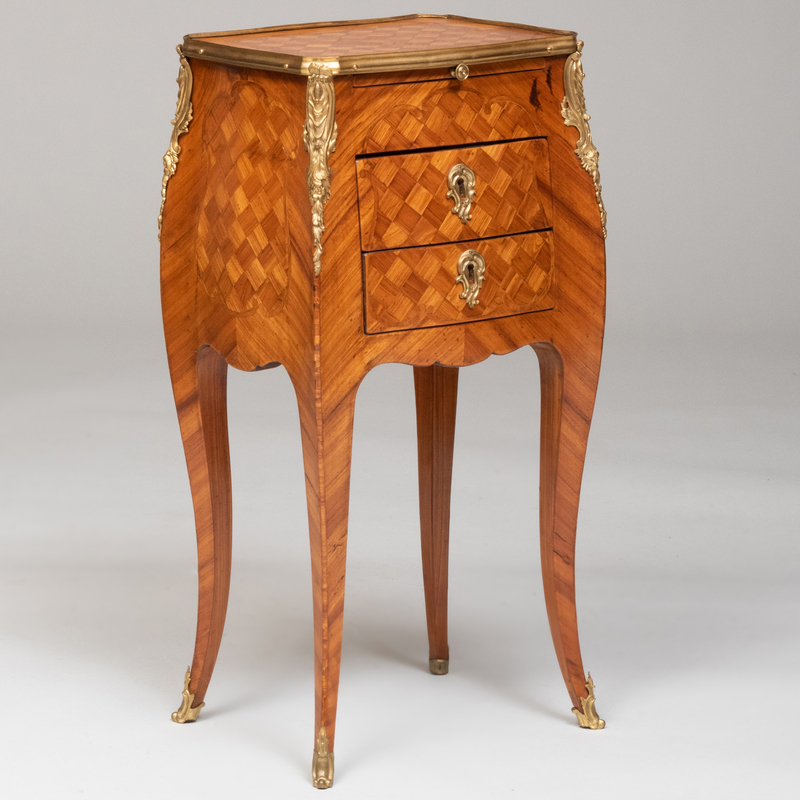 Appraisal: LOUIS XV STYLE ORMOLU-MOUNTED TULIPWOOD PARQUETRY TABLE EN CHIFFONNI RE