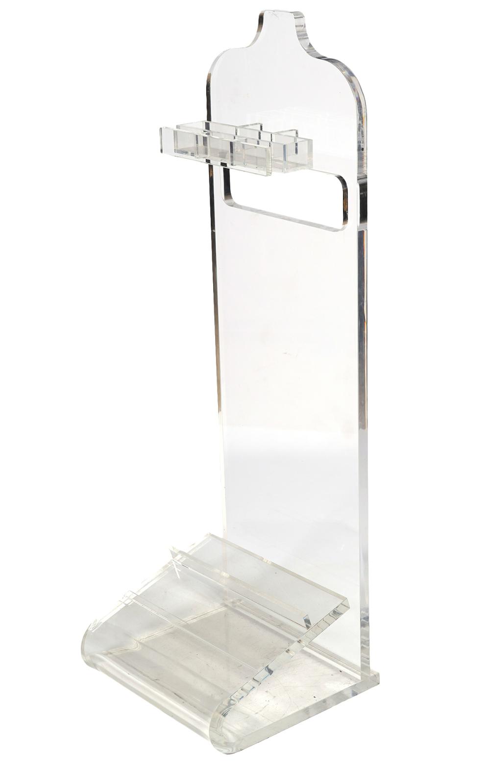 Appraisal: MODERN LUCITE VALET STANDModern lucite valet stand with angled rack