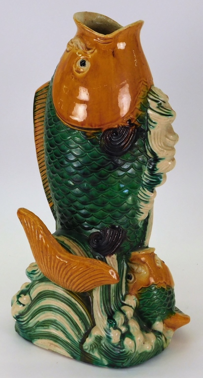 Appraisal: CHINESE SANCAI GLAZE FIGURAL POTTERY KOI FISH VASE China th