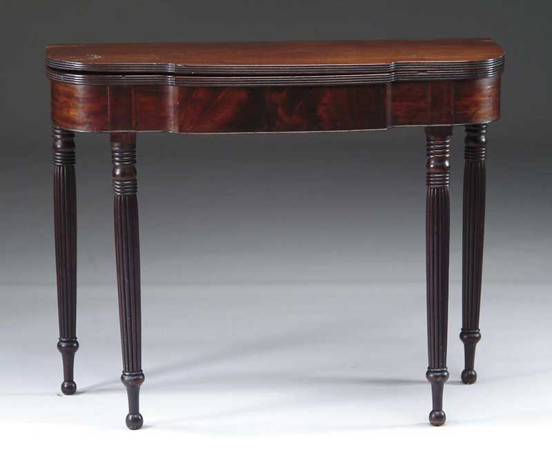 Appraisal: SHERATON SHAPED TOP MAHOGANY CARD TABLE The reeded edge shaped