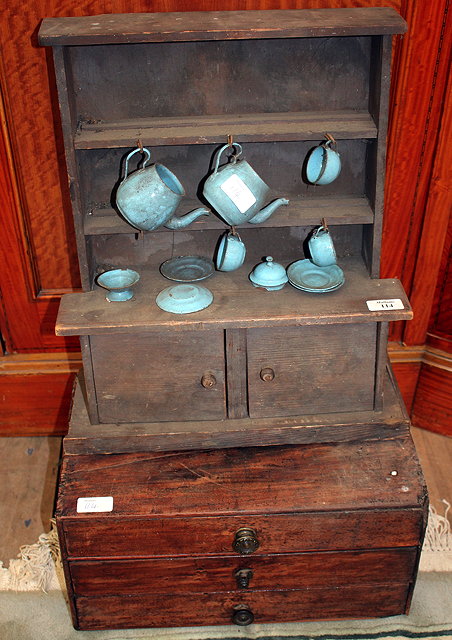 Appraisal: A MINIATURE PINE DRESSER the plate rack above two cupboard