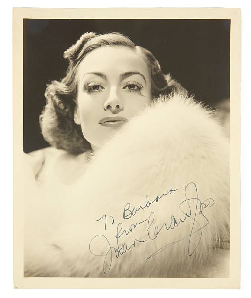 Appraisal: A Joan Crawford signed black and white photograph s A