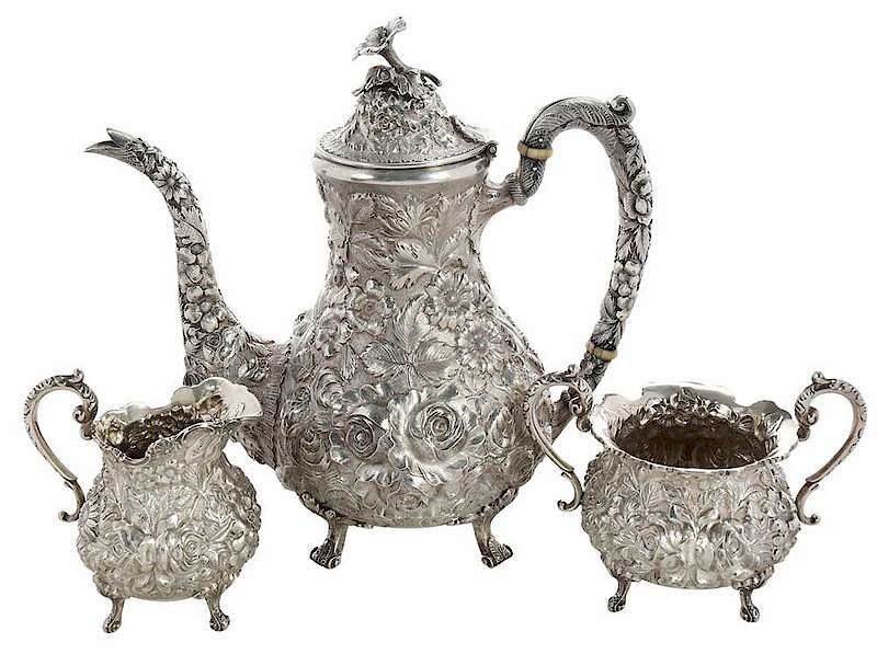 Appraisal: Three Piece Kirk Repousse Tea Service American th century pear