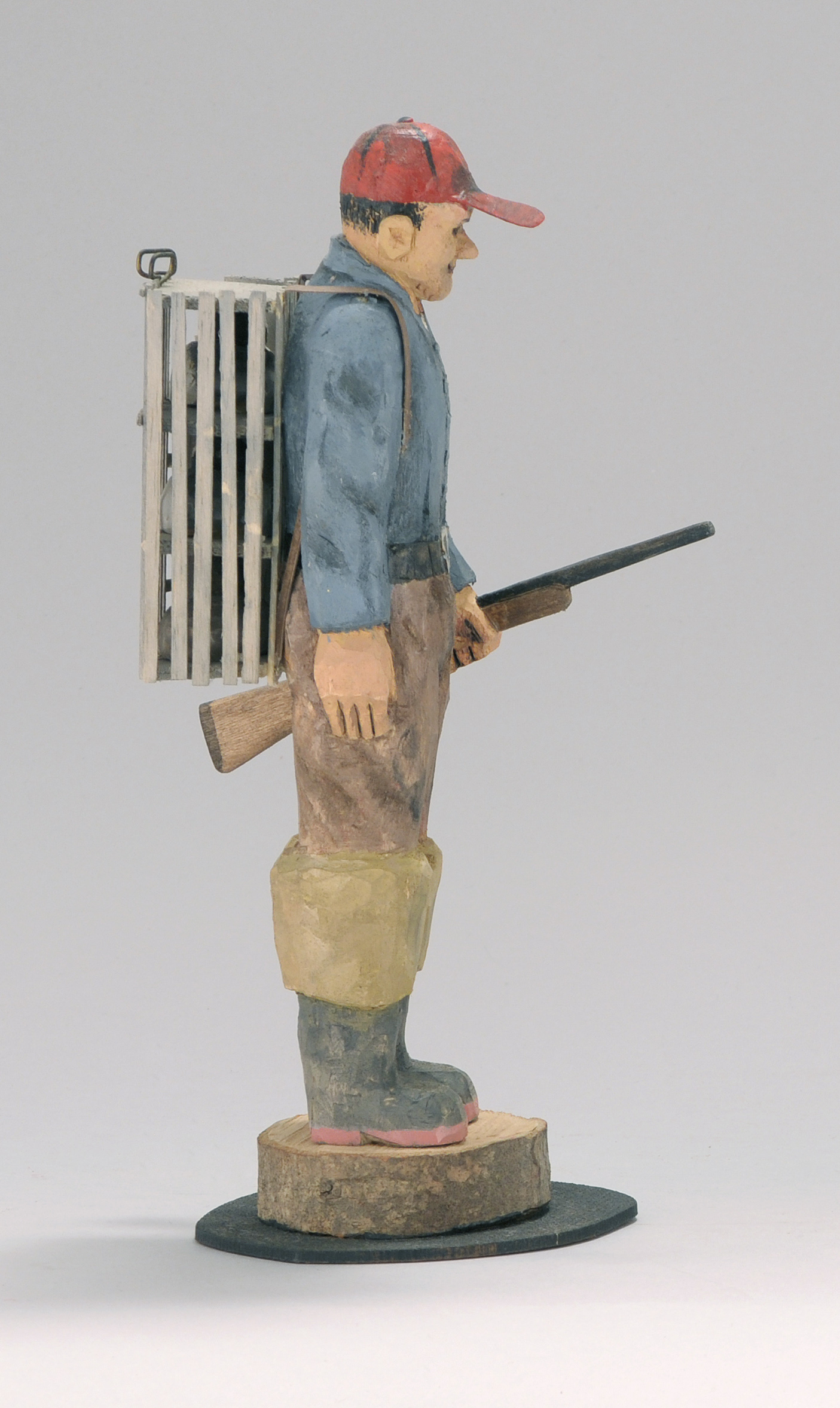 Appraisal: CARVED WOODEN FIGURE OF A DUCK HUNTER By Stan Sparre