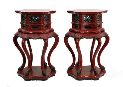 Appraisal: A pair of red lacquer hexagonal stands raised on cabriole