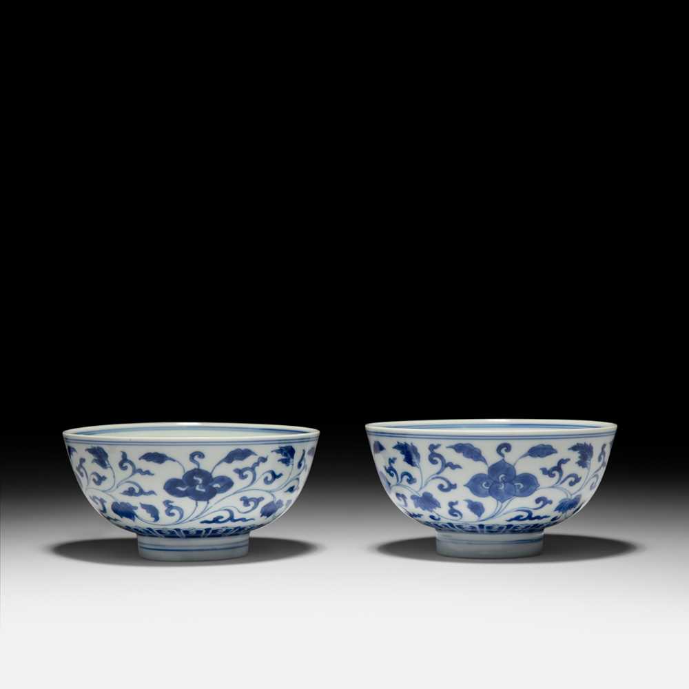 Appraisal: PAIR OF BLUE AND WHITE 'FLOWER' BOWLS QING DYNASTY KANGXI