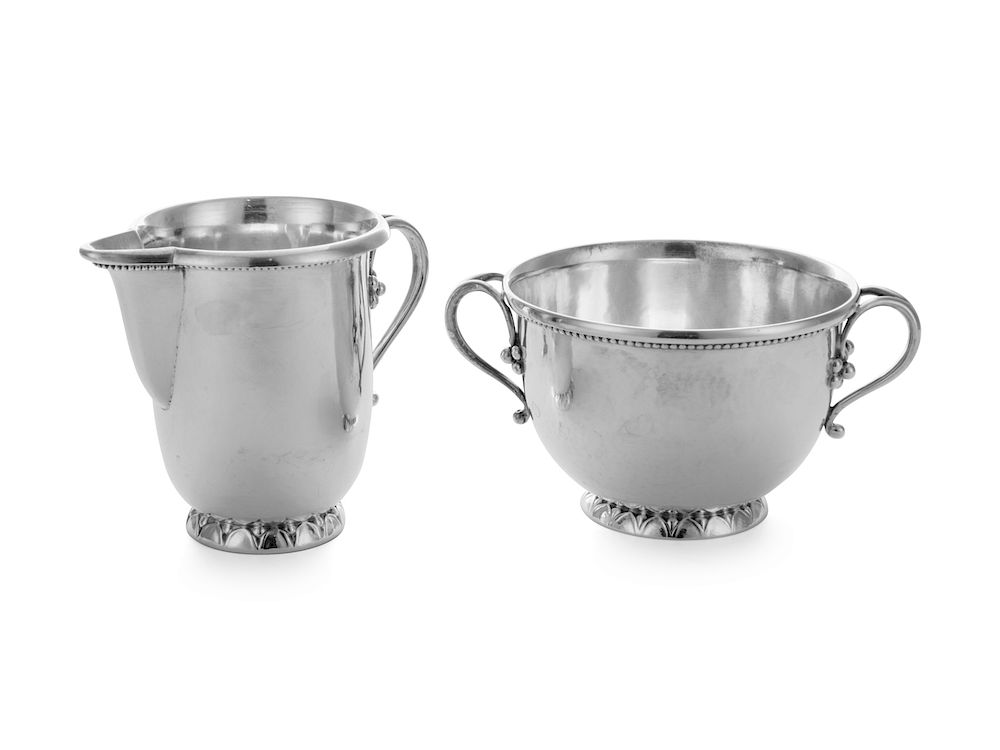 Appraisal: A Danish Silver Creamer and Sugar A Danish Silver Creamer