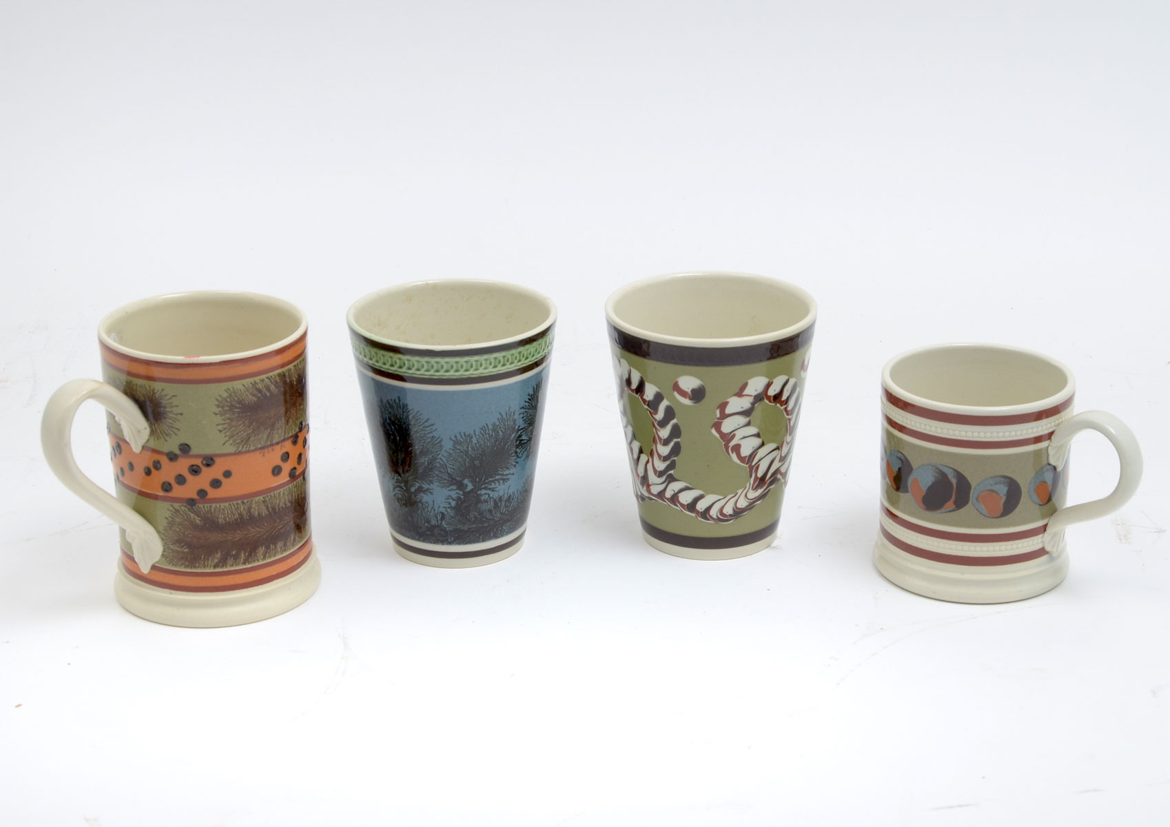 Appraisal: PC DON CARPENTIER MOCHAWARE MUGS Comprising - Seaweed pattern cup