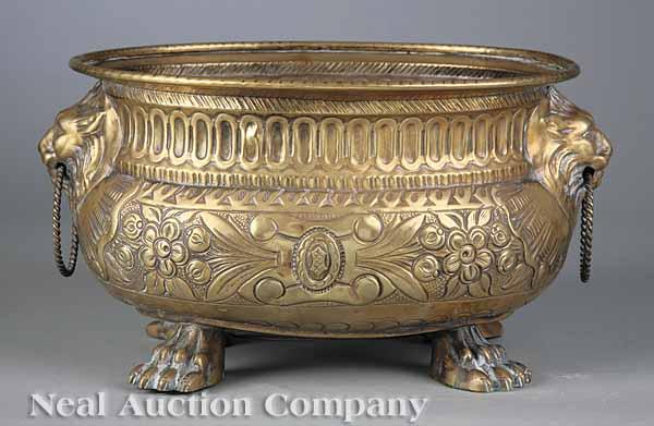 Appraisal: An Antique English Brass Repouss Jardini re late th c