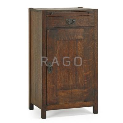 Appraisal: GUSTAV STICKLEY Bar cabinet with pullout copper shelf and lazy