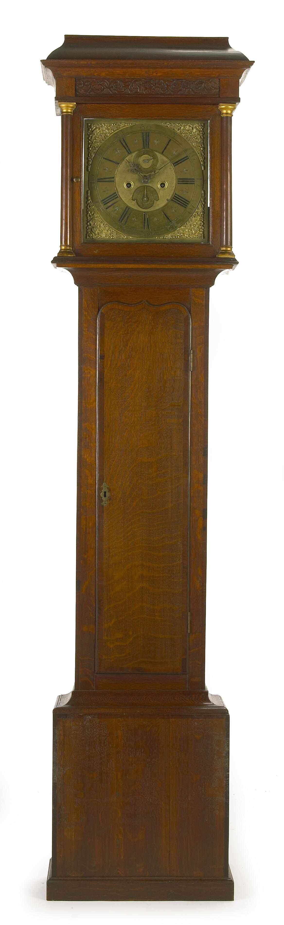 Appraisal: A George II oak long case clock inscribed 'Hampson Wreocham'