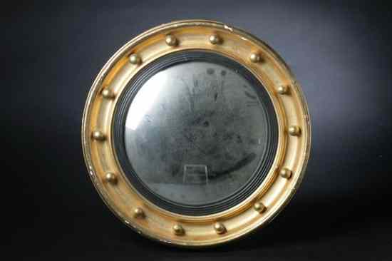 Appraisal: FEDERAL STYLE GILT-WOOD CONVEX WALL MIRROR th century Cove-molded inner