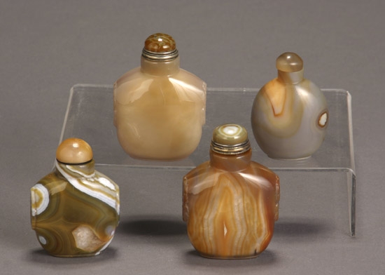 Appraisal: Four Chinese Agate Snuff Bottles th Century The first a