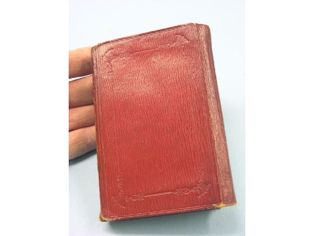 Appraisal: An early Victorian almanac within red leather binding