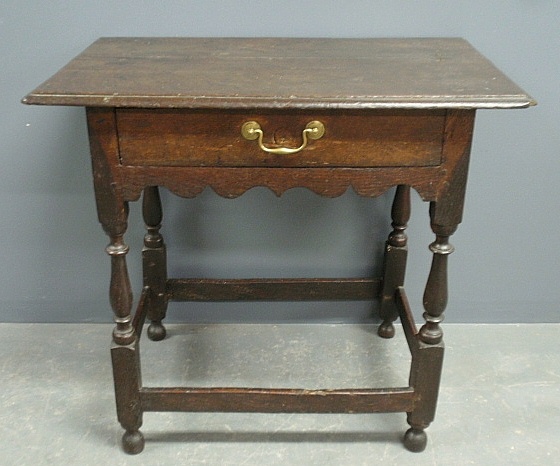 Appraisal: - English William Mary oak one-drawer table with turned legs