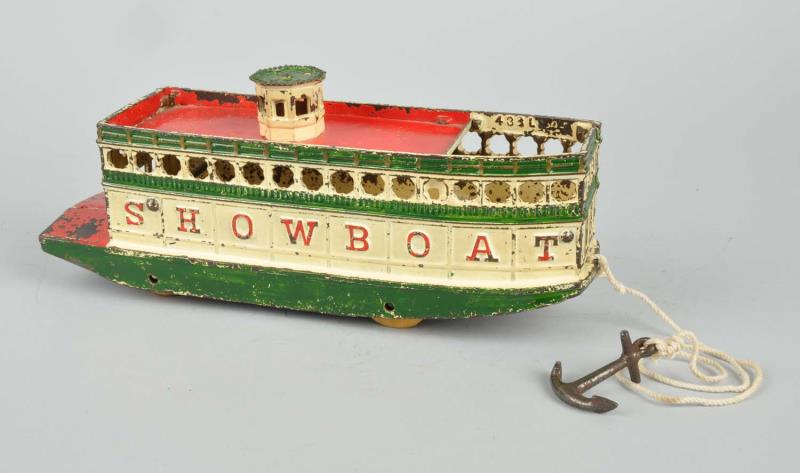 Appraisal: Cast Iron Arcade Showboat Toy Cast iron riverboat embossed Showboat