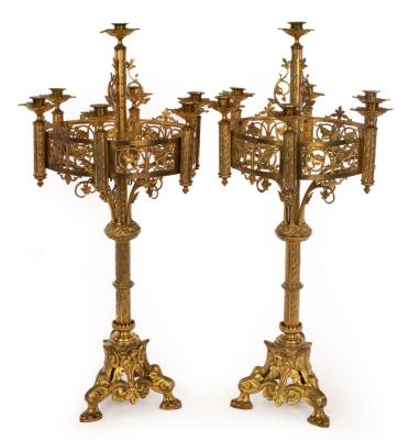 Appraisal: A pair of Gothic Revival style brass table candelabra cm