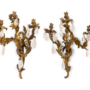 Appraisal: A Pair of Rococo Style Gilt Bronze and Crystal Three-Light