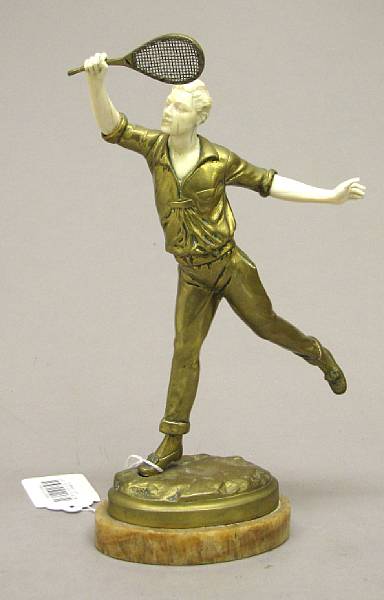 Appraisal: A French bronze and ivory figure of a tennis player