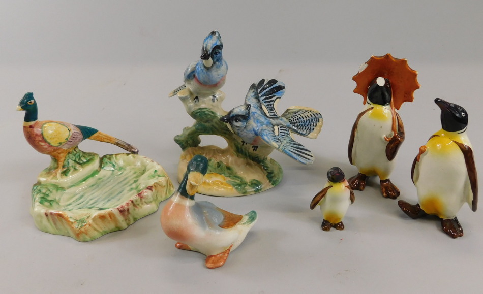 Appraisal: Various Beswick figures to include a penguin family AF small