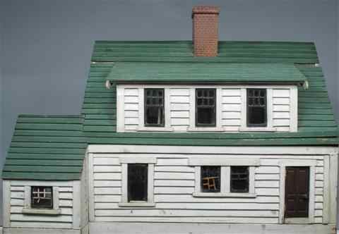 Appraisal: WHITE PAINTED WOOD CLAPBOARD DOLLHOUSE early to mid twentieth century