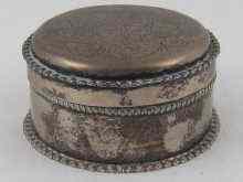 Appraisal: A circular th c silver box with engraved scene of