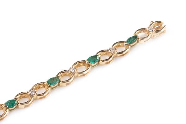 Appraisal: An emerald diamond and k gold bracelet length in