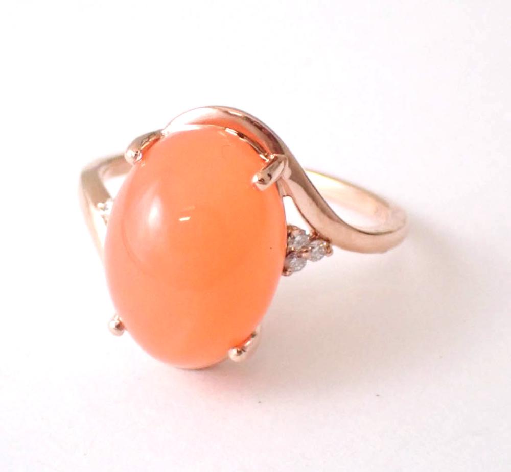 Appraisal: PEACH MOONSTONE CAT'S EYE AND DIAMOND RING The k gold