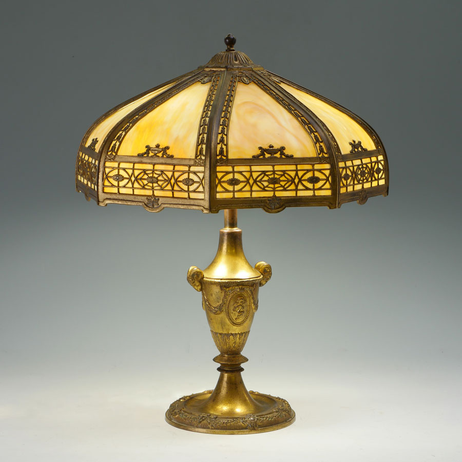 Appraisal: BENT PANEL SLAG GLASS PARLOR LAMP Heavy gilt bronze base