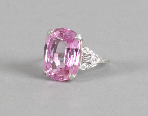 Appraisal: Platinum and diamond ring with cushion cut pink synthetic sapphire