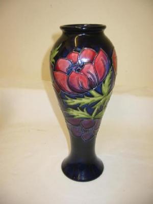 Appraisal: A MOORCROFT POTTERY VASE of slim baluster form tube lined