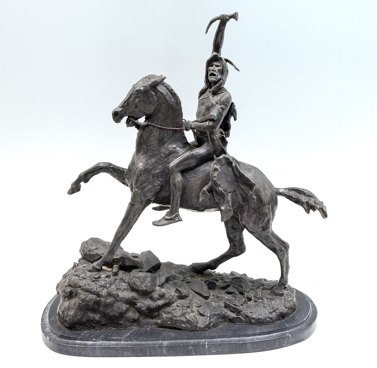 Appraisal: LARGE BRONZE AFTER REMINGTON Native American Indian on Horseback Commonly