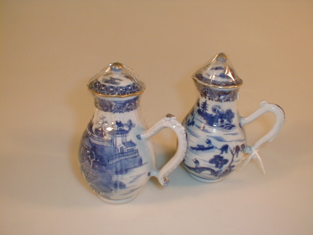 Appraisal: A pair of Chinese porcelain sparrow beak jugs with covers