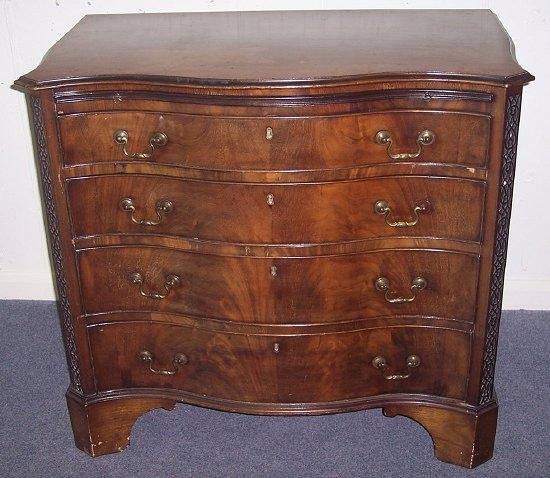 Appraisal: A serpentine mahogany chest of th Century design fitted a