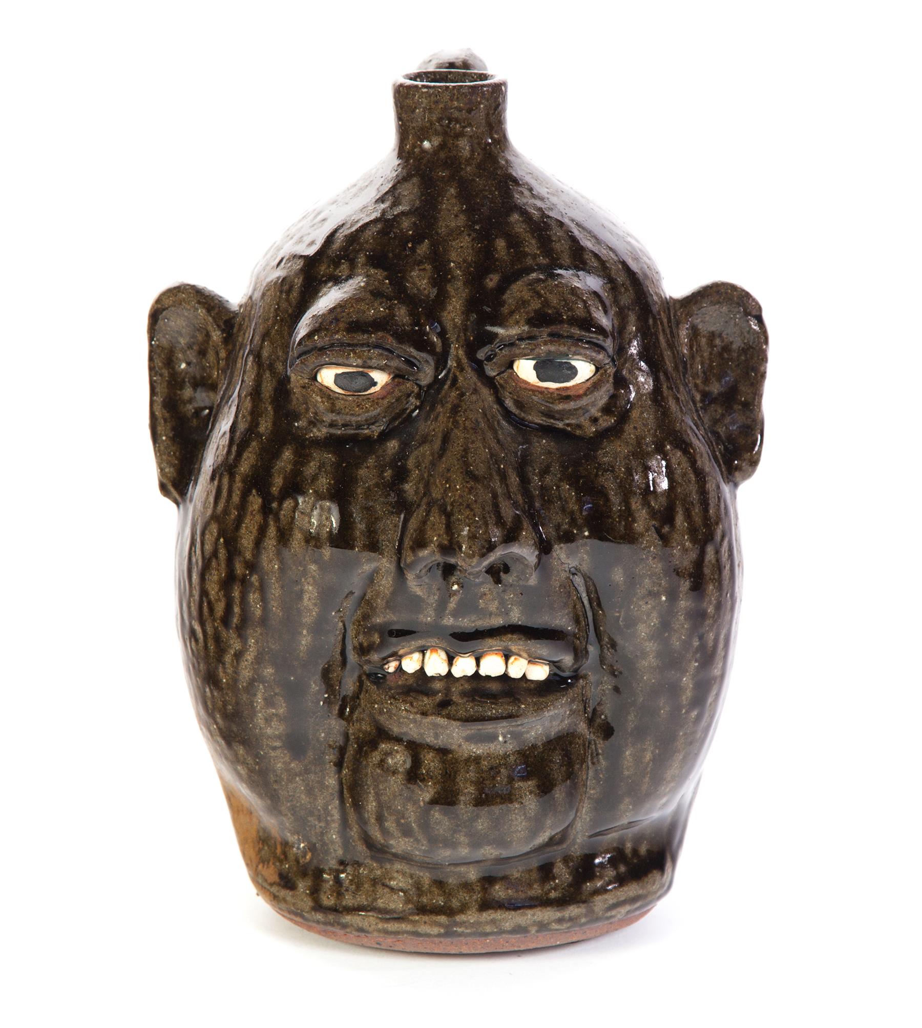 Appraisal: GROTESQUE FACE JUG BY LANIER MEADERS GEORGIA - Signed on