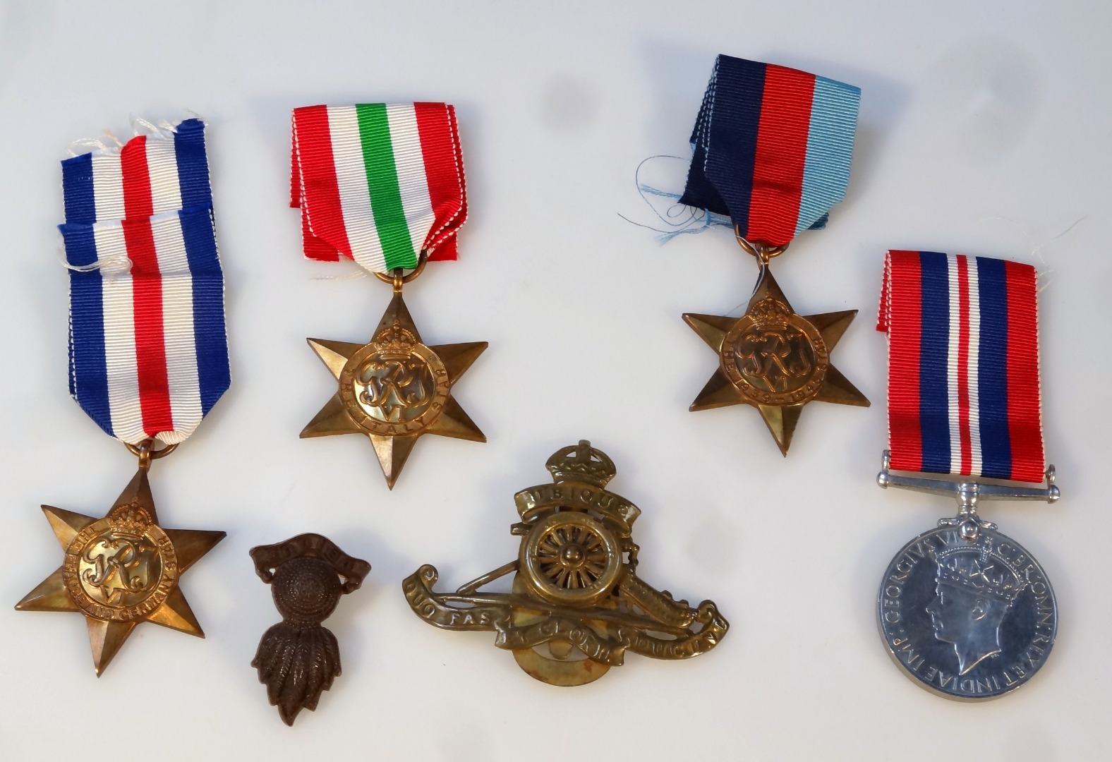 Appraisal: Various WWII medals comprising three Stars Campaign and two cap