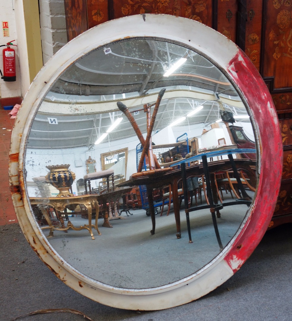 Appraisal: A large mid th century circular convex mirror with white