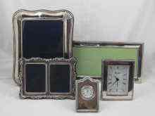 Appraisal: Two silver fronted clocks together with three modern silver faced