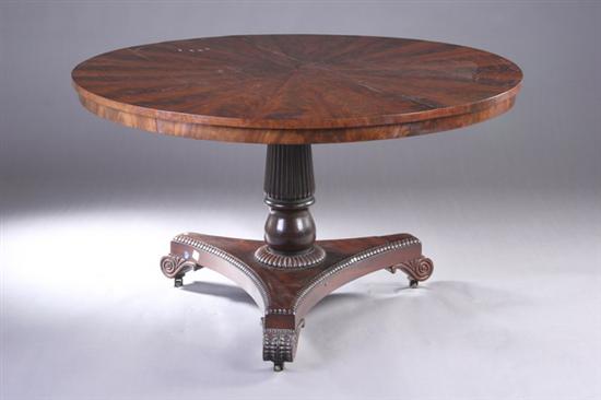 Appraisal: ENGLISH EMPIRE FLAME MAHOGANY CENTER TABLE th century Circular top