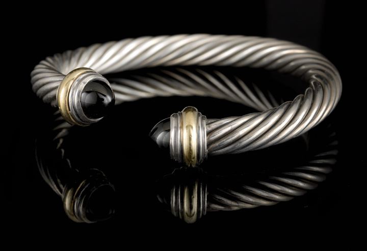 Appraisal: David Yurman Sterling Silver Fourteen-Karat Yellow Gold and Onyx Bangle