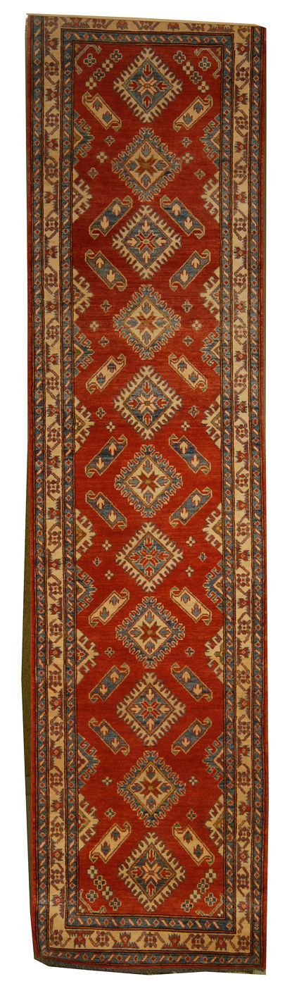 Appraisal: ORIENTAL RUG KAZAK DESIGN RUNNER ' x ' Geometric elements