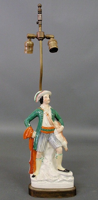 Appraisal: Staffordshire huntsman figure c mounted to a lamp Figure h