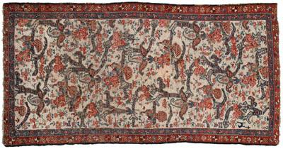 Appraisal: Persian rug repeating asymmetric floral designs including peacocks human figures