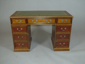 Appraisal: A reproduction mahogany twin pedestal desk th century with gilt