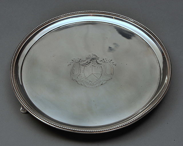 Appraisal: A GEORGE III CIRCULAR SILVER WAITER with beaded edge and