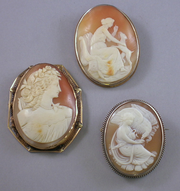 Appraisal: Three Shell-carved Cameo Brooches one framed in kt gold