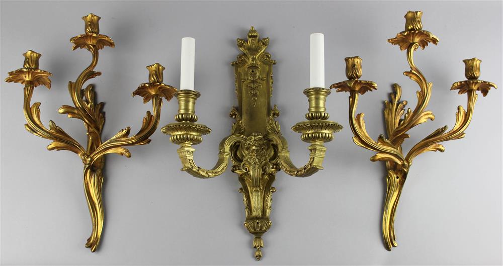 Appraisal: THREE GILT BRONZE WALL LIGHTS including a single made in