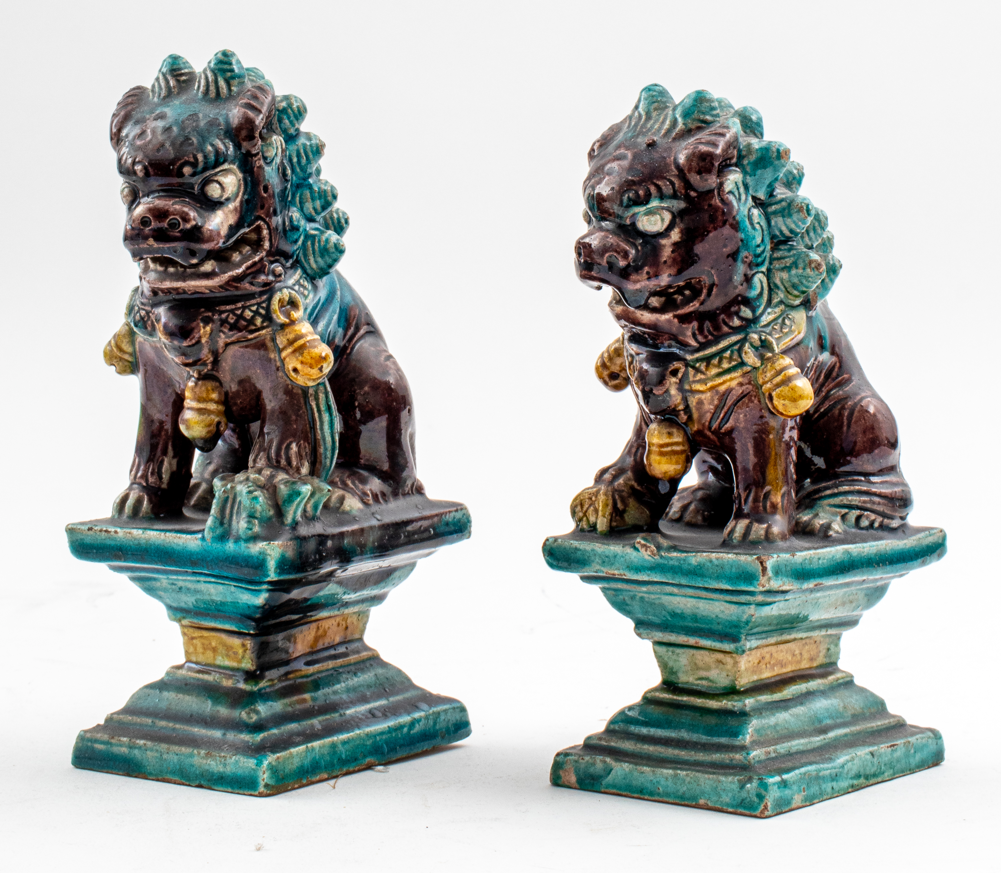 Appraisal: CHINESE CERAMIC FOO DOGS PAIR Pair of Chinese sancai glazed