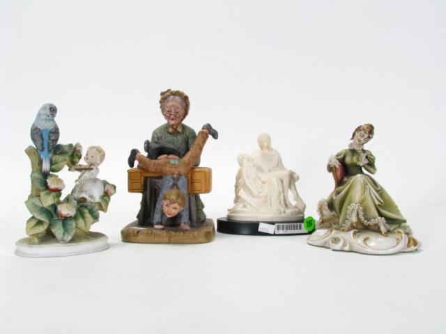 Appraisal: Collection of Four Figurines including a A Borsato depicting a